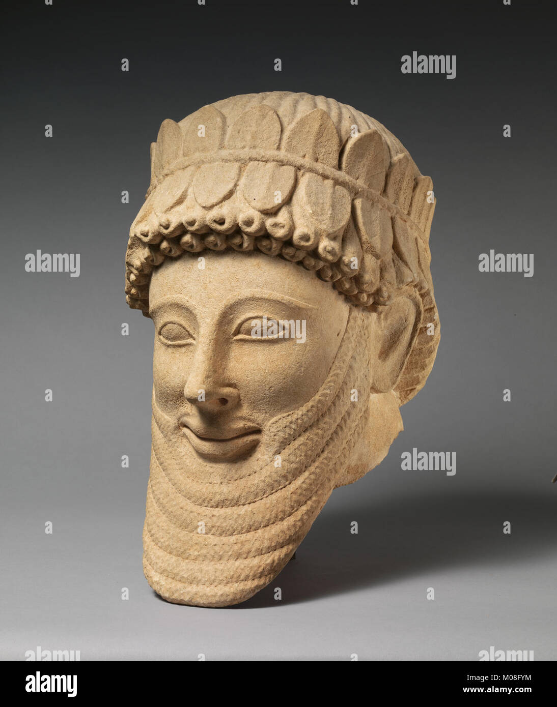 Limestone sculpture of a male head, illustrating ancient craftsmanship ...