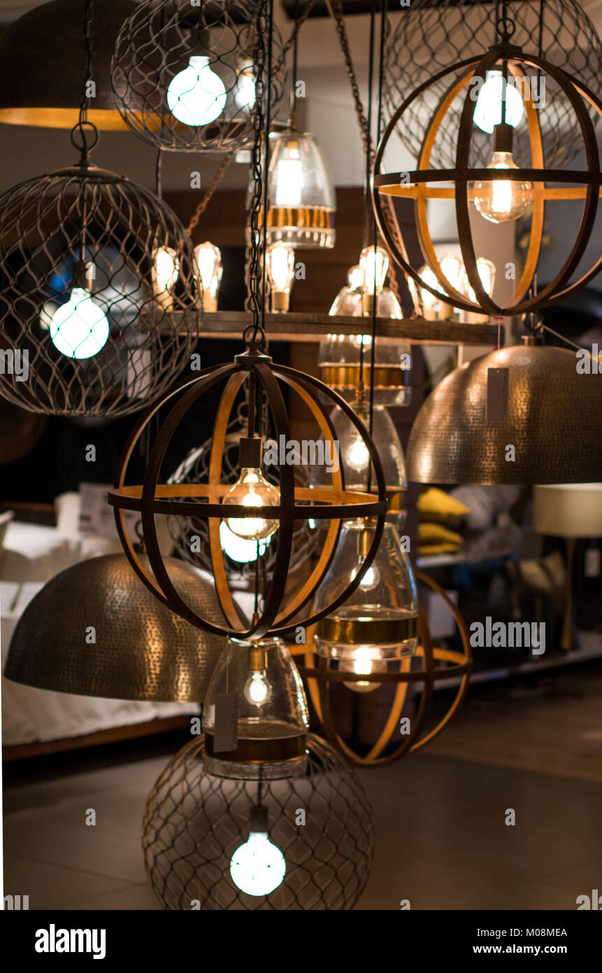 Elegant light fixture on display in furniture store with edison type