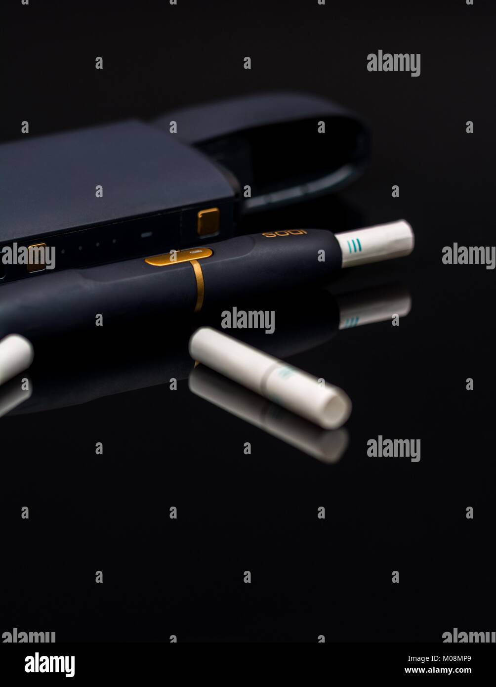 Prague, Czech republic - January 02, 2018:Electronic cigarette, tobacco heating system Iqos of Marlboro  on black background Stock Photo