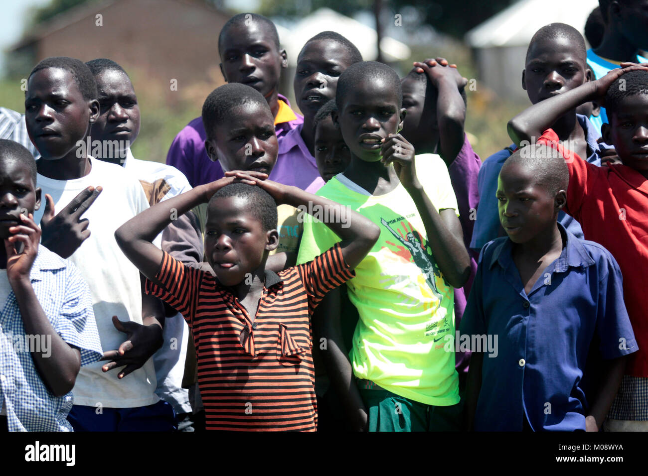 Children line au after a community race in Otuke district in northern Uganda Stock Photo
