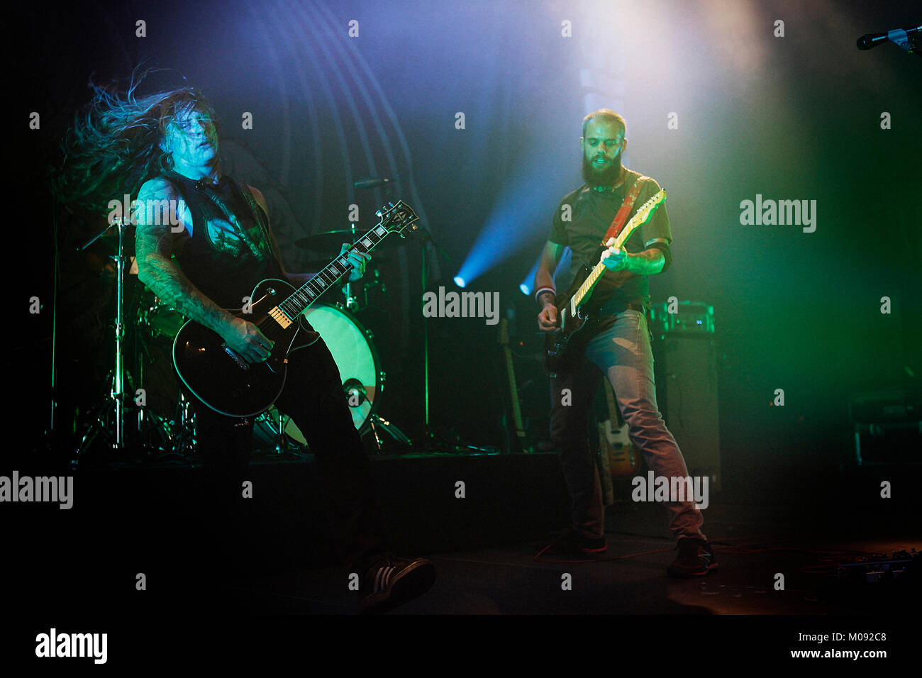 The American metal band Baroness performs a live concert at Das Freizeitzentrum West (FZW) in Dortmund. Here vocalist and guitarist John Baizley (R) is pictured live on stage with Peter Adams (L). Germany, 03/10 2013. Stock Photo