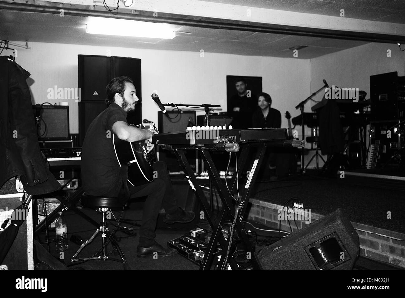 The musicians from the British post-punk band Editors gather for a ...