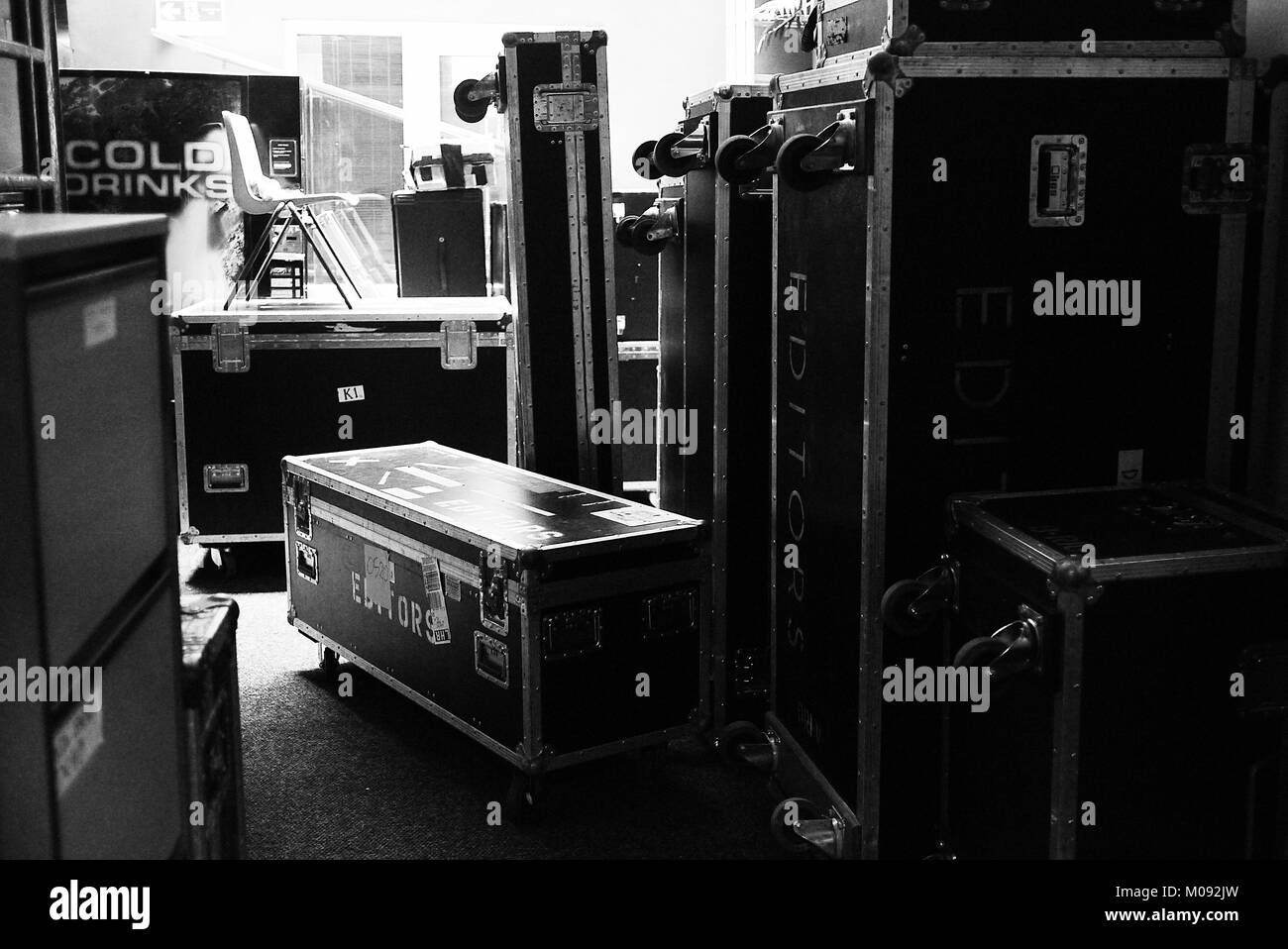 Flight cases with music instruments and equipment are stacked in the British postpunk band
