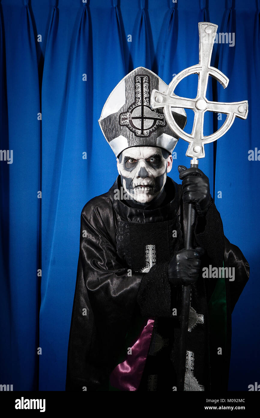 The Swedish heavy metal band Ghost originates from Linköping. The band's  vocalist Papa Emeritus II wears skull make-up and is dressed as a Roman  Catholic pope and is here pictured backstage before