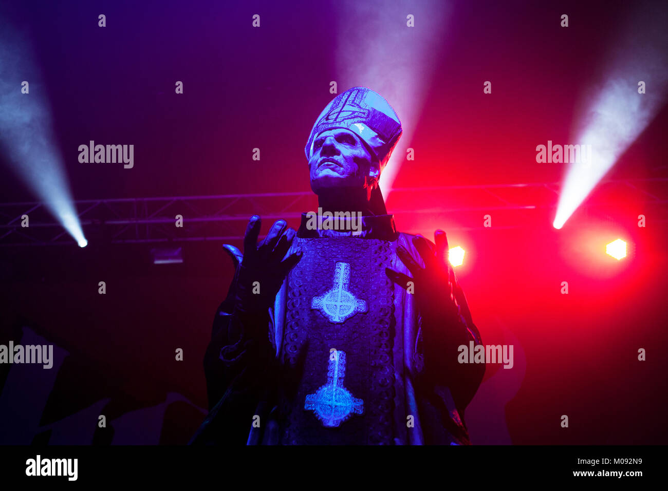 The Swedish heavy metal band Ghost performs a live concert at the Manchester Academy. The band’s vocalist Papa Emeritus II wears skull make-up and is dressed as a Roman Catholic pope and is here pictured live on stage. United Kingdom, 11/11 2013. Stock Photo