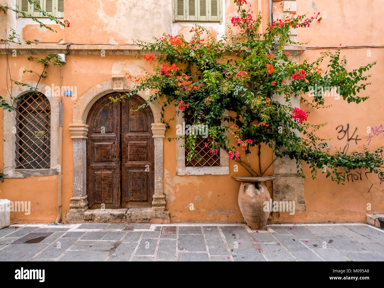 old door and entrance with plants in the old town of Rethymno, Europe, Crete, Greece, ,, Rethymno, Europe, Crete, Greece, travel, tourism, destination Stock Photo
