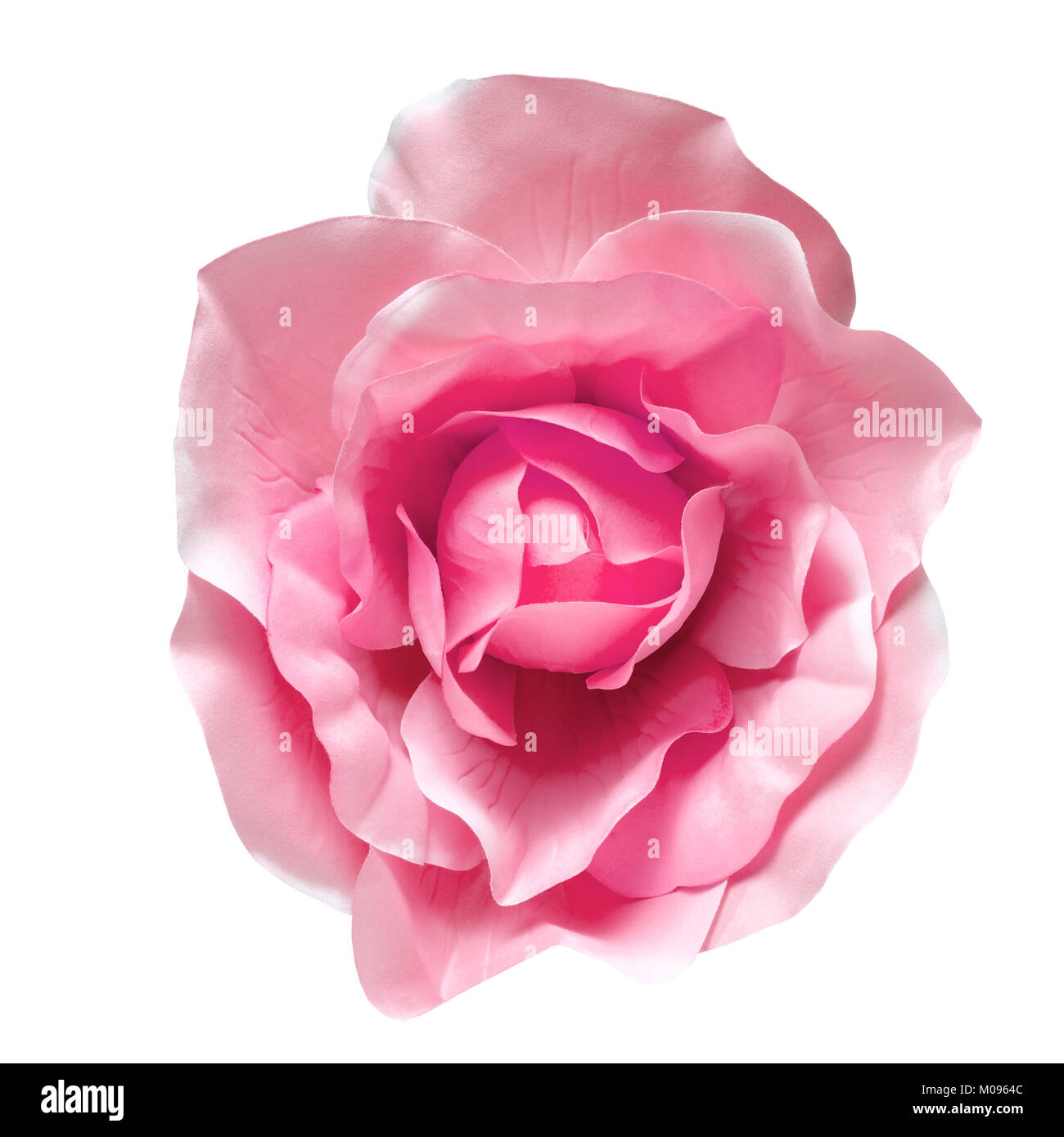 Artificial flower isolated on a white background. A soft light over fabric texture in  pink color. Clipping path Stock Photo