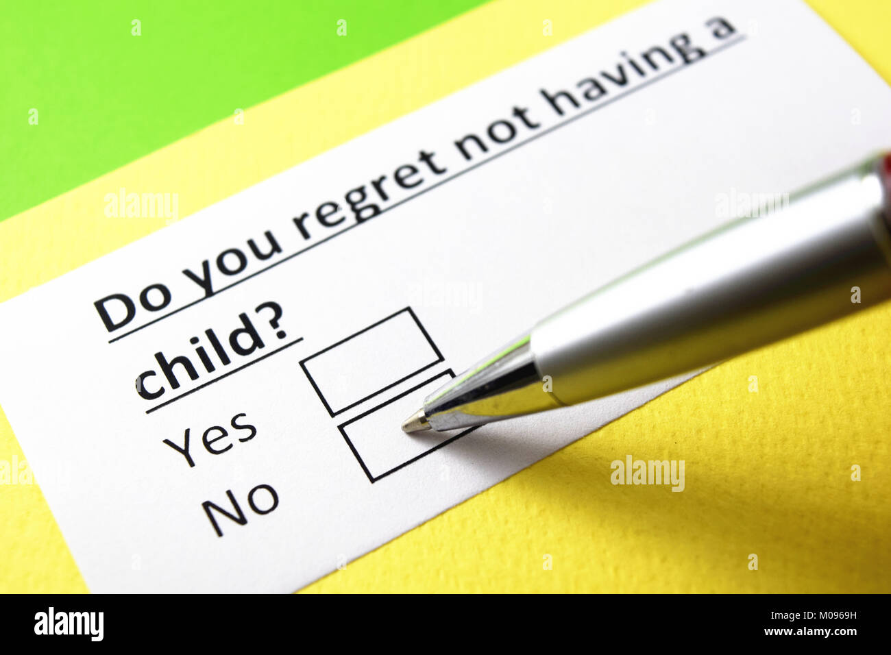 Do you regret not having a child? Yes or no? Stock Photo