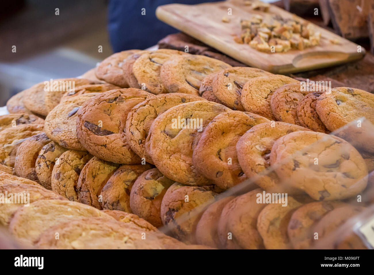 Artisan Chocolate Chip Cookies on display on a market stall in Borough Market, London Stock Photo