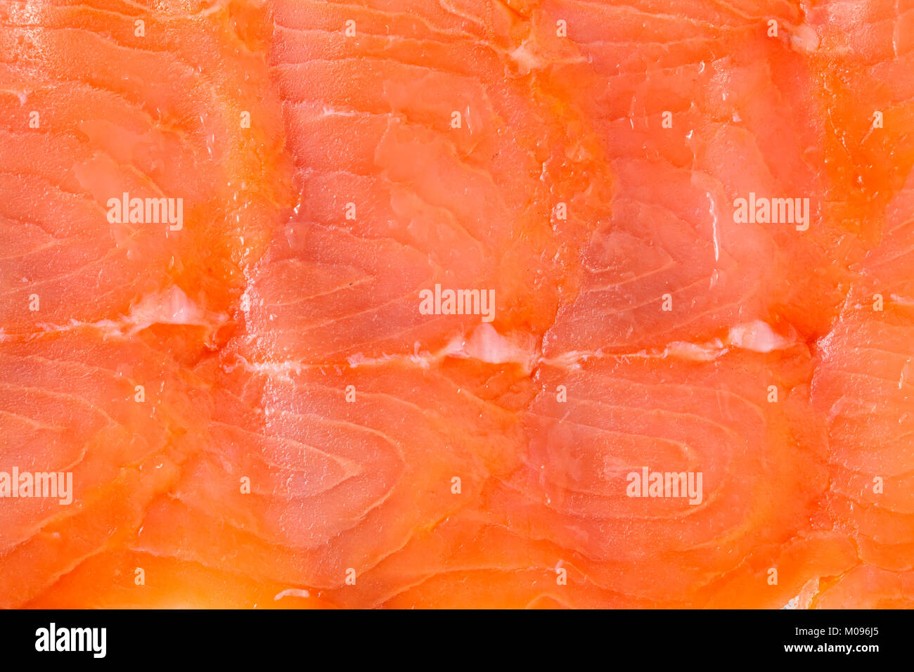 slices of fatty smoked fish deli food bacground Stock Photo Alamy