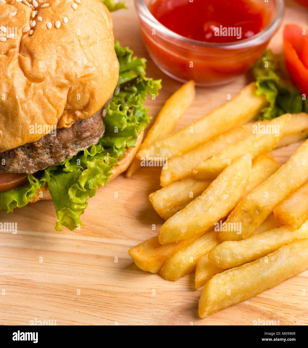 Unhealthy Burger Meal Representing French Fries And Cholesterol Stock