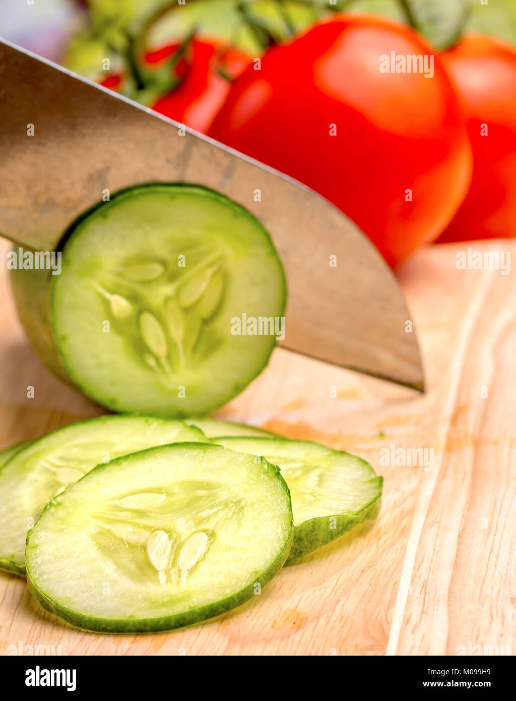 Cutting Cucumber Meaning Organic Cucumbers And Chop Stock Photo Alamy