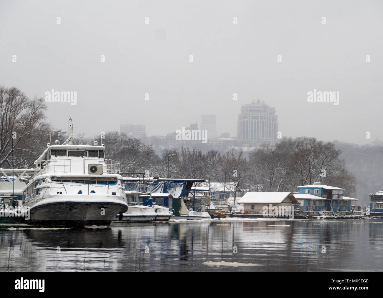 Kiev, Ukraine. 19th January, 2018. Ships at the winter parking of the Venetian island. The Dnieper is not only the main river of Ukraine. It is the beloved river of the Ukrainians. The history of the country is connected with it. On the Dnieper went to conquer Constantinople squads of Kiev princes. On this river the trade route 'From the Varangians to the Greeks' was held. In this river there was a baptism of Kievan Rus’. Credit: Igor Golovnov/Alamy Live News Stock Photo