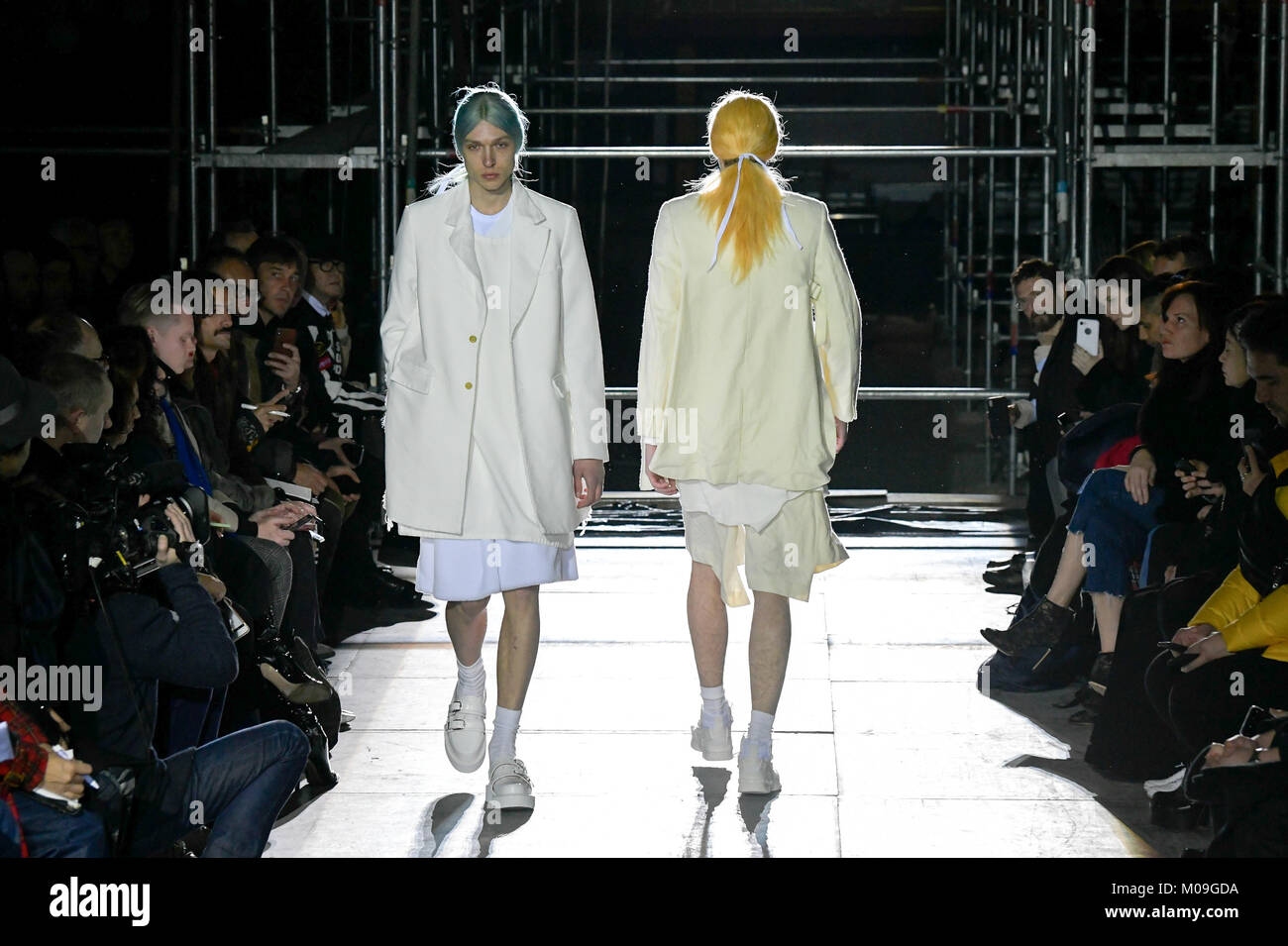 Paris, France. 19th Jan, 2018. Models present creations of Comme des Garcons for its 2018-19 autumn/winter collection during the men's fashion week in Paris, France, Jan. 19, 2018. Credit: Piero Biasion/Xinhua/Alamy Live News Stock Photo