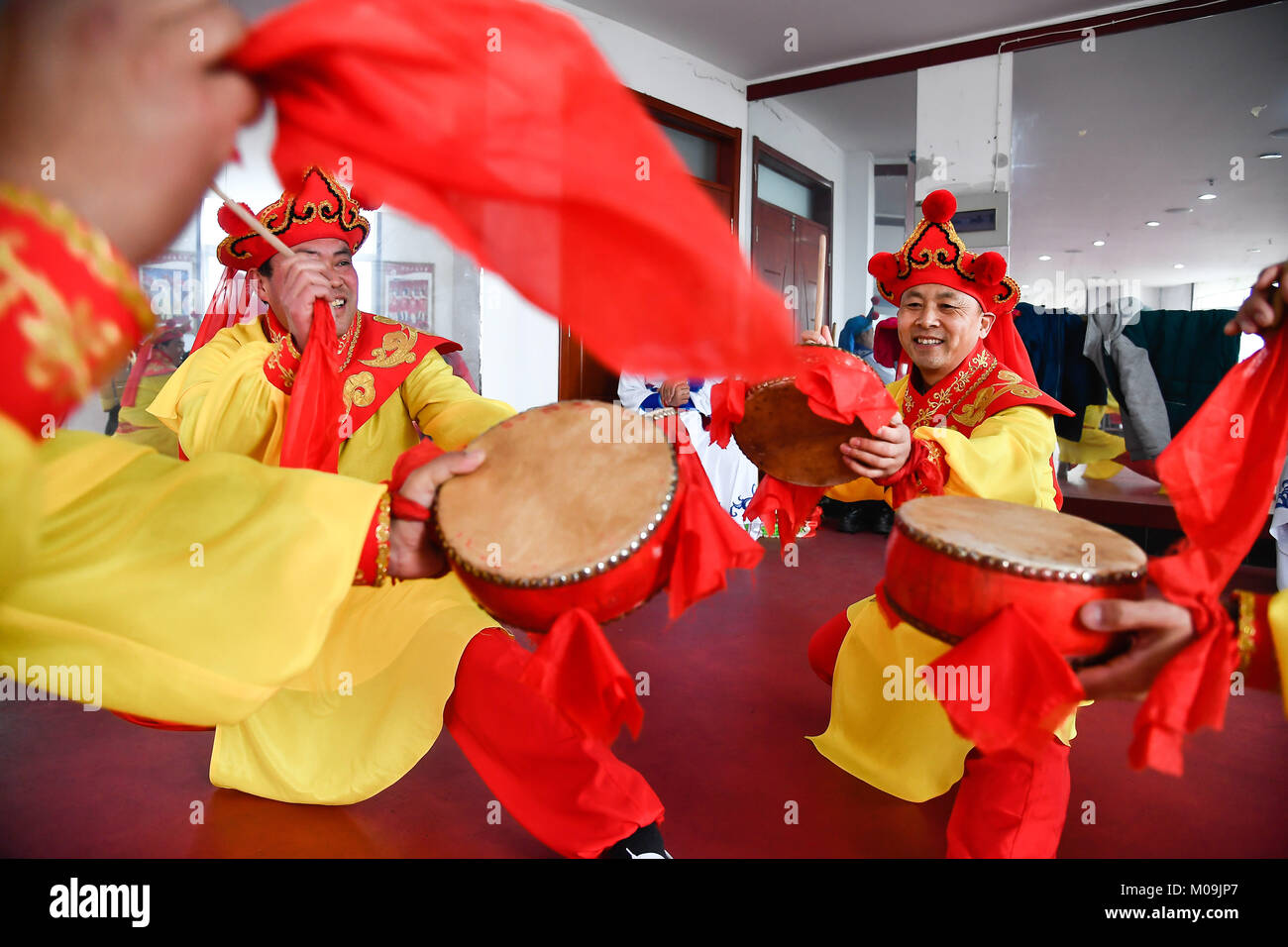 Jinan, China's Shandong Province. 19th Jan, 2018. Actors of Guzi yangge dance troupe rehearse at a culture center in Shanghe County, east China's Shandong Province, Jan. 19, 2018. Invited by the China Cultural Center in Stockholm, the troupe will participate in Spring Festival celebration events in Sweden from Feb. 9 to 14. Credit: Guo Xulei/Xinhua/Alamy Live News Stock Photo