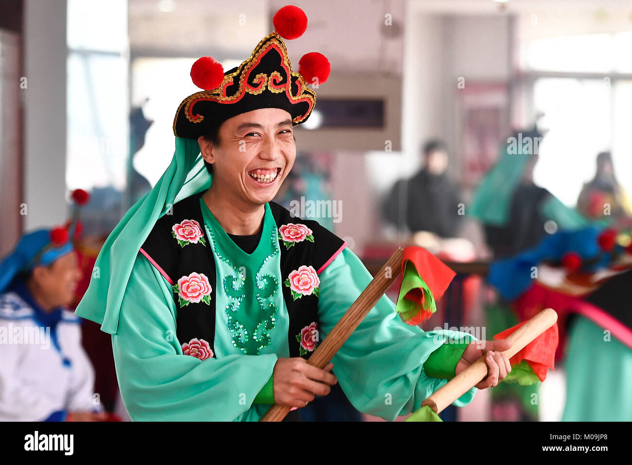 Jinan, China's Shandong Province. 19th Jan, 2018. Actors of Guzi yangge dance troupe rehearse at a culture center in Shanghe County, east China's Shandong Province, Jan. 19, 2018. Invited by the China Cultural Center in Stockholm, the troupe will participate in Spring Festival celebration events in Sweden from Feb. 9 to 14. Credit: Guo Xulei/Xinhua/Alamy Live News Stock Photo