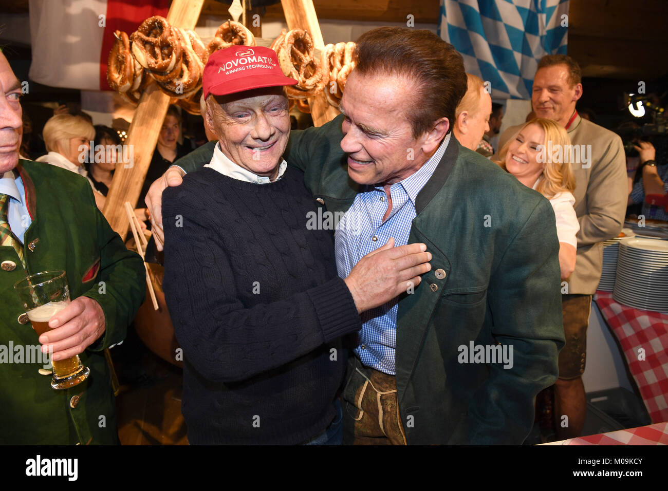 Going, Germany. 19th Jan, 2018. Former formula one driver Niki Lauda (L)  and actor Arnold Schwarzenegger attend the 27th traditional 'Weißwurst  party' (lit. Bavarian white sausage party) at the Stanglwirt Inn in