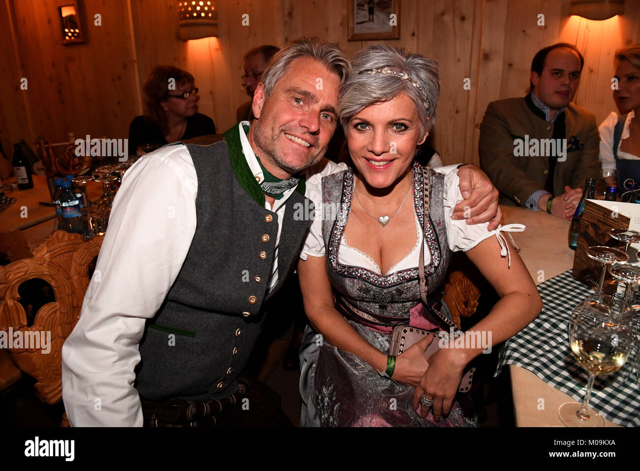Going, Germany. 19th Jan, 2018. Presenter Birgit Schrowange and her husband Frank Spothelfer (L) attend the 27th traditional 'Weisswurst party' (lit. Bavarian white sausage party) at the Stanglwirt Inn in Going, Germany, 19 January 2018. The 'Weisswurst party' is an event where stars and celebrities meet a day before the legendary Hahnenkamm downhill race. Credit: Felix Hörhager/dpa/Alamy Live News Stock Photo