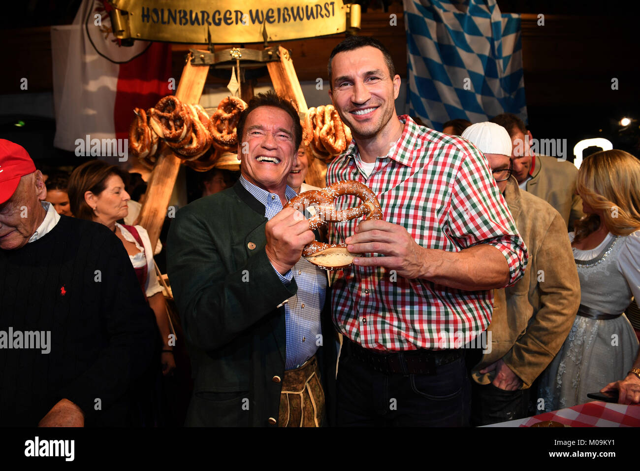 Actor Arnold Schwarzenegger (L) and boxer  Wladimir Klitschko attend the 27th traditional 'Weisswurst party' (lit. Bavarian white sausage party) at the Stanglwirt Inn in Going, Germany, 19 January 2018. The 'Weisswurst party' is an event where stars and celebrities meet a day before the legendary Hahnenkamm downhill race. Photo: Felix Hörhager/dpa Stock Photo