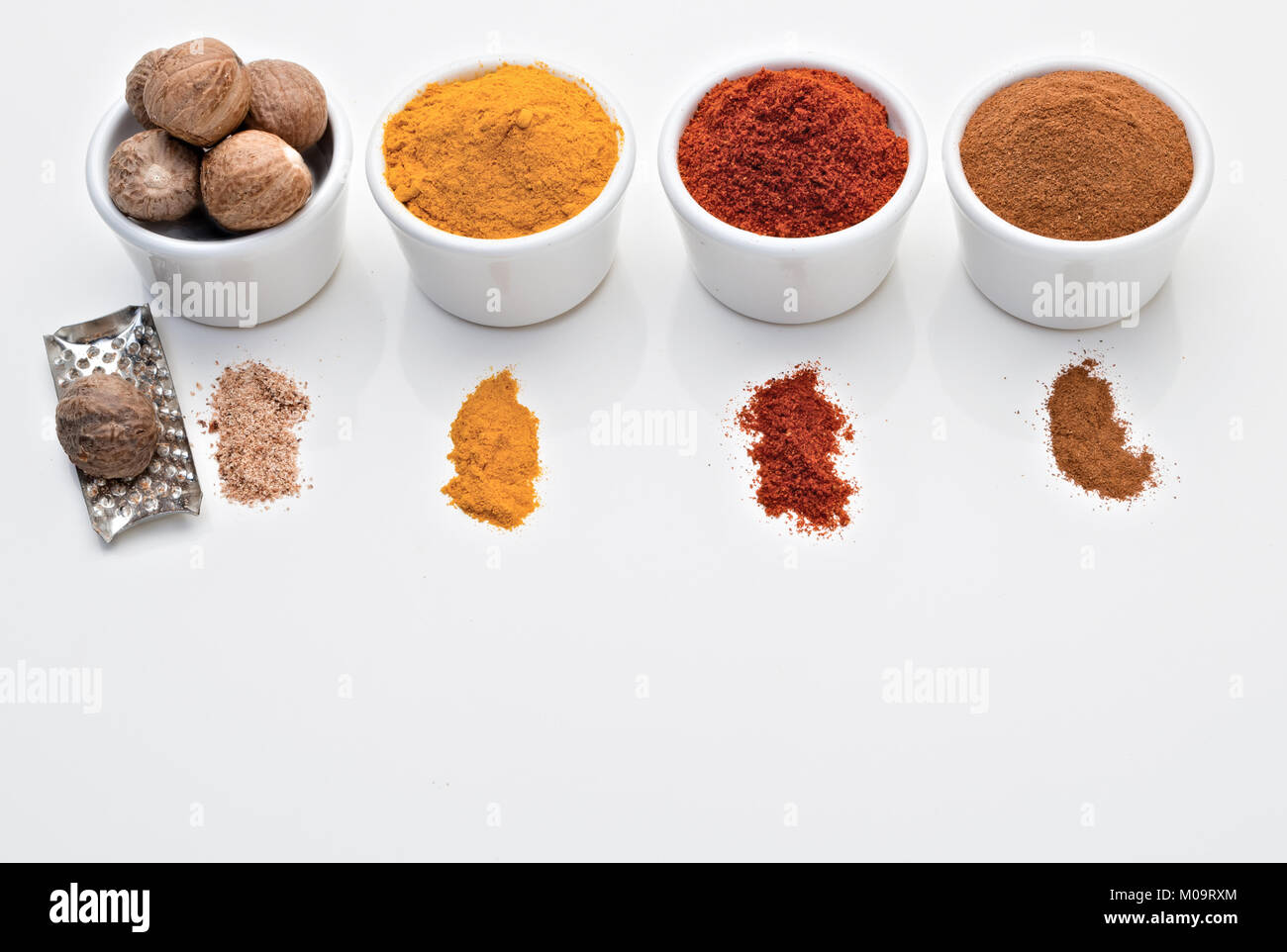 spices cinnamon paprika turmeric nutmeg from above Stock Photo Alamy