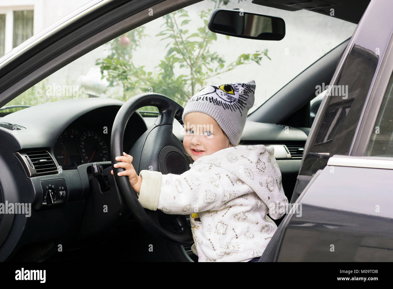 child sitting car