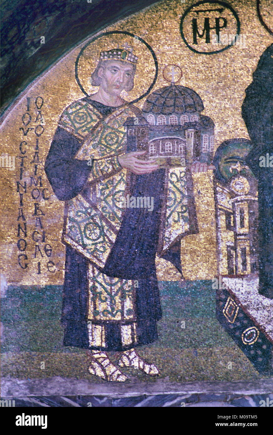 Byzantine Mosaic of Byzantine Emperor Justinian I (c482-565) aka Saint Justinian the Great Holding a Model or Offering of the Hagia Sophia Church to Virgin Mary in the Hagia Sophia Church Museum, Sultanahmet, Istanbul, Turkey Stock Photo