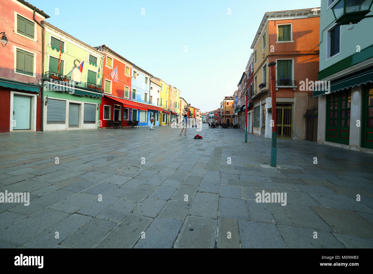 main street of Burano Island near Venice in ITALY in the early morning Stock Photo