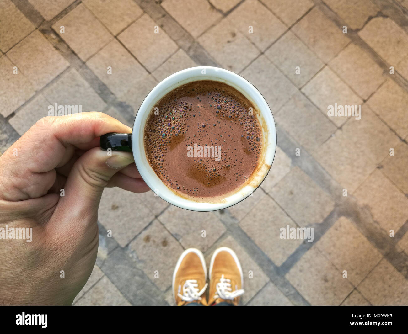 A Male Hand Is Holdiing A Cup Of Greek Coffee Outdoors Greece Stock Photo Alamy