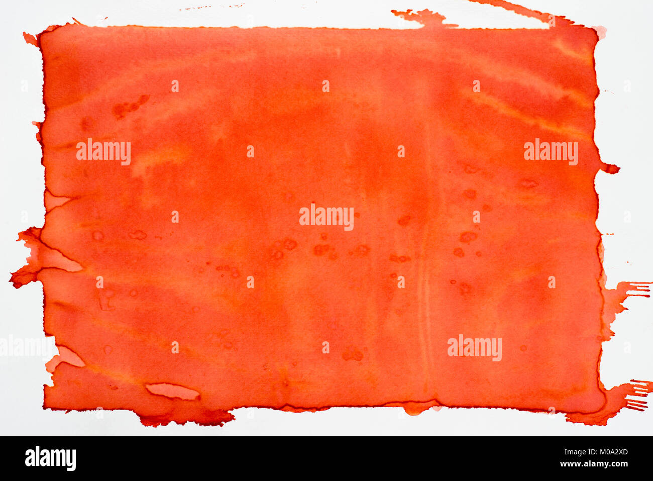 orange color painted watercolor on white paper background texture Stock Photo