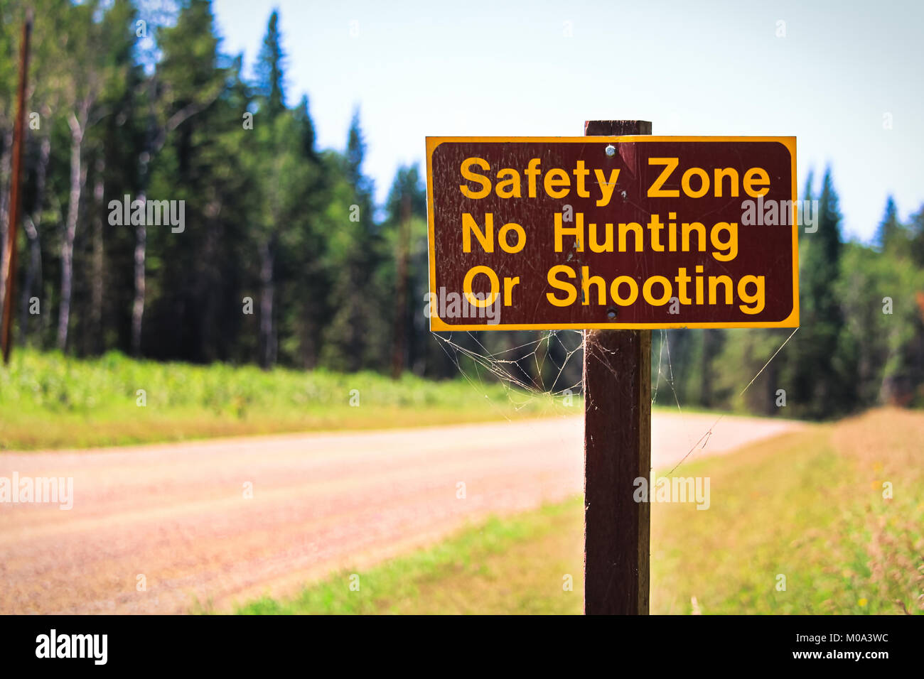 A Safety Zone, No Hunting or Shooting sign Stock Photo Alamy