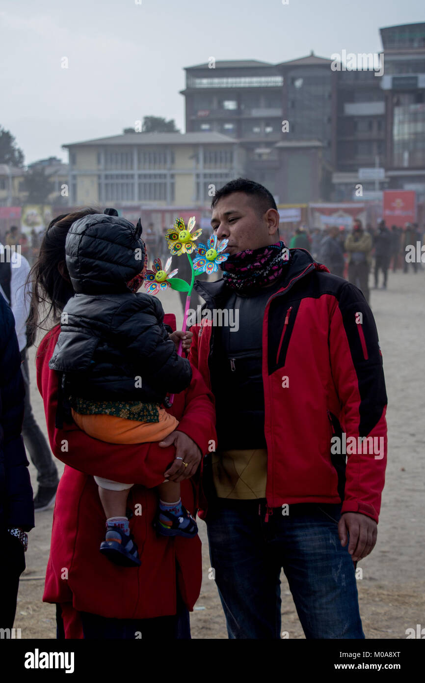Noemie Repetto / Le Pictorium -  2018, Jan 15 - Maghi festival. New Year of Nepal in Tundikhel through the day. The festival had started from Kathmandu Durbar Square. -  16/01/2018  -  Nepal / Kathmandu  -   Maghe Sankranti is the first day of the month of Magh of Bikram Sambat. Magh is the tenth month of the year.   Sankranti is the Sanskrit word in Eastern Astrology which refers to the transmigration of the Sun from one Rashi (sign of the zodiac) to another. In very simple, the word sankranti is the first day of the Nepali calendar. Then obviously, there are 12 sankrantis in a year. Makar Sa Stock Photo