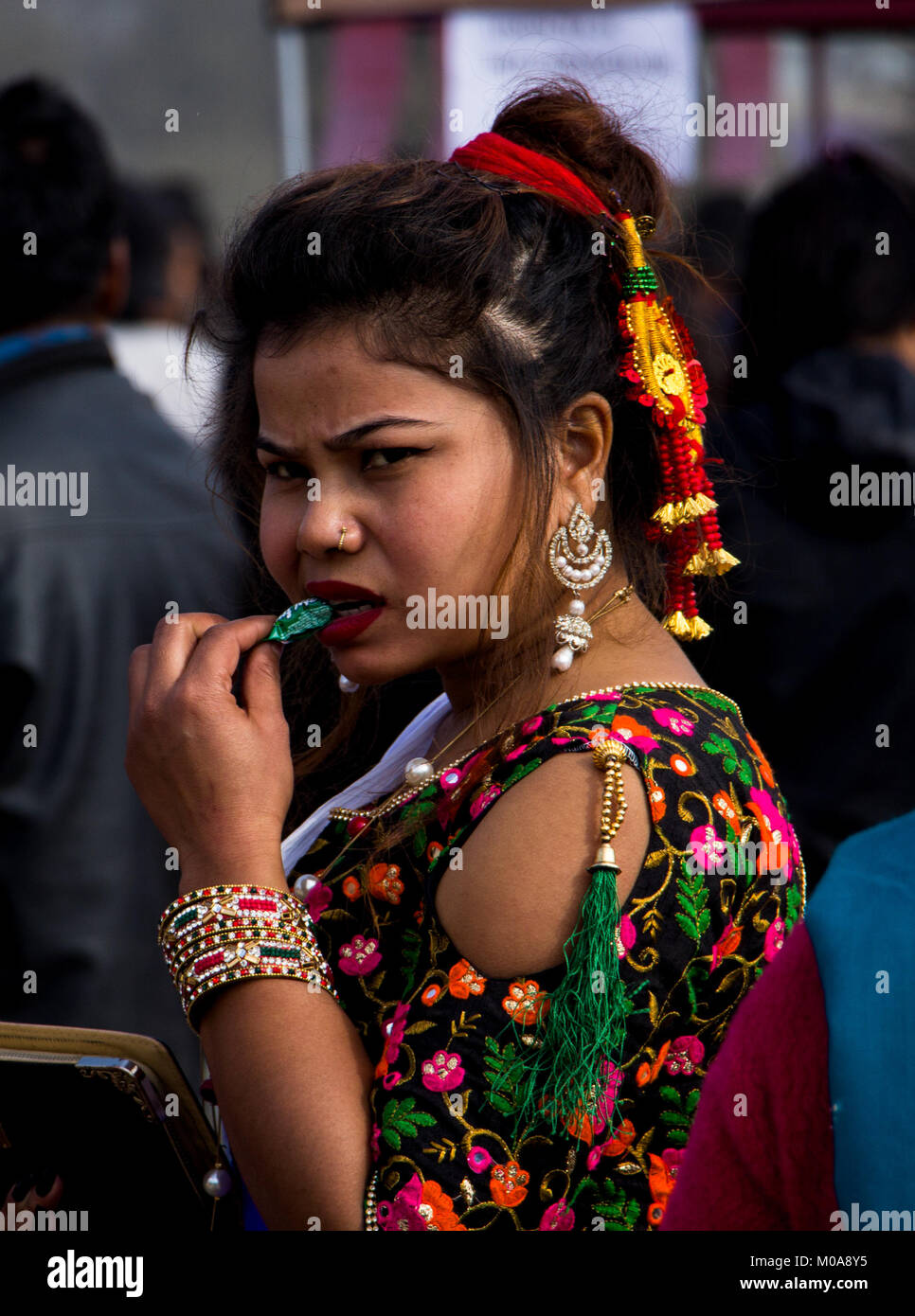 Noemie Repetto / Le Pictorium -  2018, Jan 15 - Maghi festival. New Year of Nepal in Tundikhel through the day. The festival had started from Kathmandu Durbar Square. -  16/01/2018  -  Nepal / Kathmandu  -   Maghe Sankranti is the first day of the month of Magh of Bikram Sambat. Magh is the tenth month of the year.   Sankranti is the Sanskrit word in Eastern Astrology which refers to the transmigration of the Sun from one Rashi (sign of the zodiac) to another. In very simple, the word sankranti is the first day of the Nepali calendar. Then obviously, there are 12 sankrantis in a year. Makar Sa Stock Photo