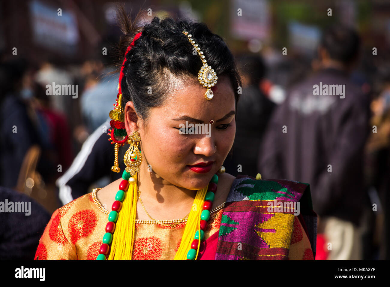 Noemie Repetto / Le Pictorium -  2018, Jan 15 - Maghi festival. New Year of Nepal in Tundikhel through the day. The festival had started from Kathmandu Durbar Square. -  16/01/2018  -  Nepal / Kathmandu  -   Maghe Sankranti is the first day of the month of Magh of Bikram Sambat. Magh is the tenth month of the year.   Sankranti is the Sanskrit word in Eastern Astrology which refers to the transmigration of the Sun from one Rashi (sign of the zodiac) to another. In very simple, the word sankranti is the first day of the Nepali calendar. Then obviously, there are 12 sankrantis in a year. Makar Sa Stock Photo