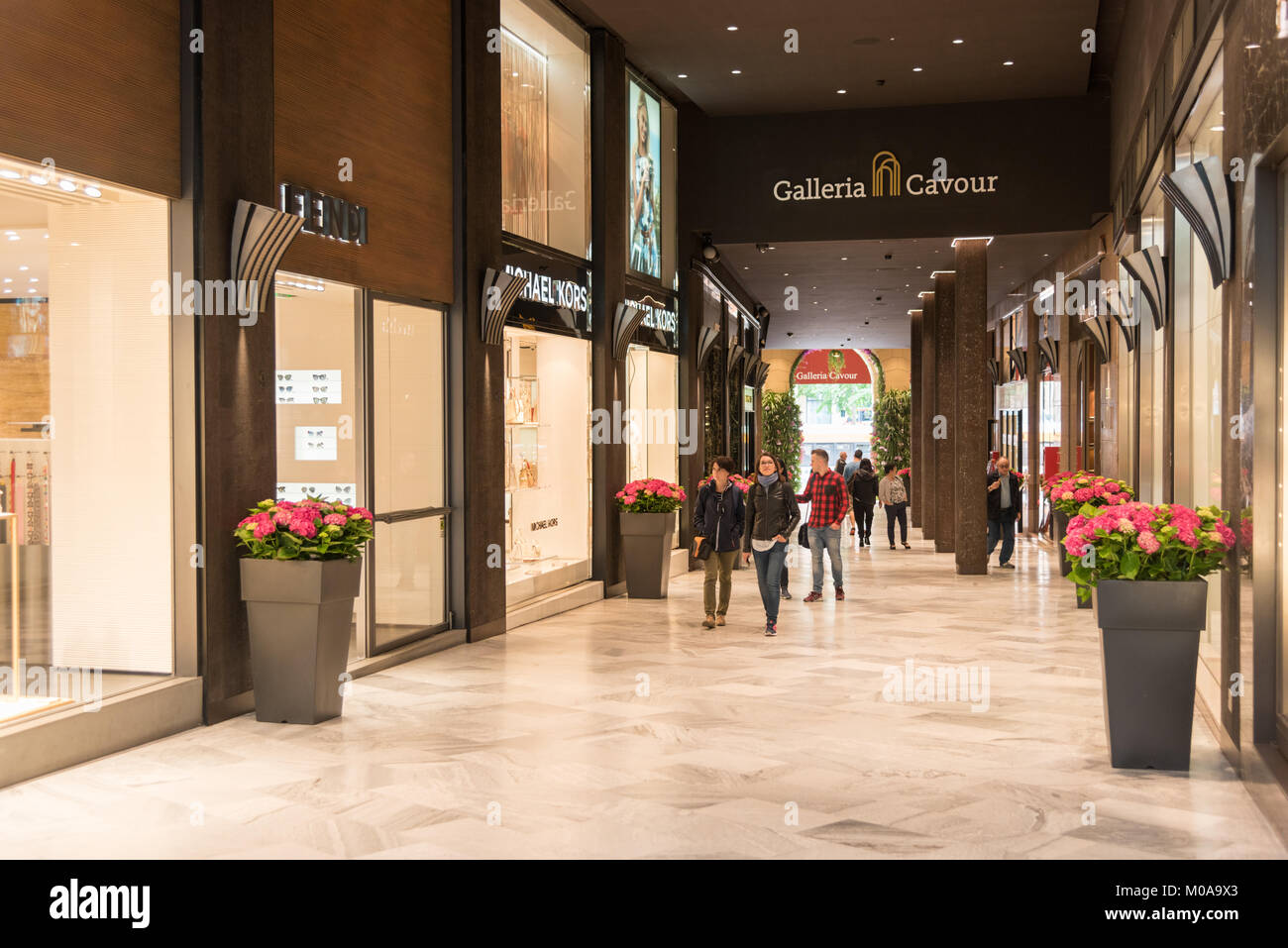 People in the luxury designer shops in the Galleria Cavour shopping