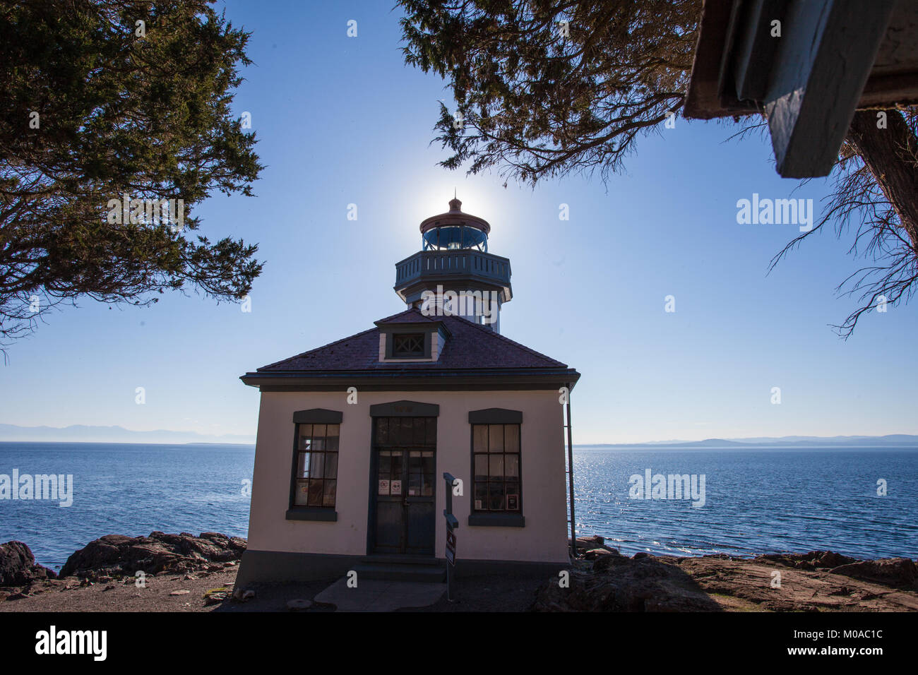 San Juan Lighthouse on the Ocean Stock Photo