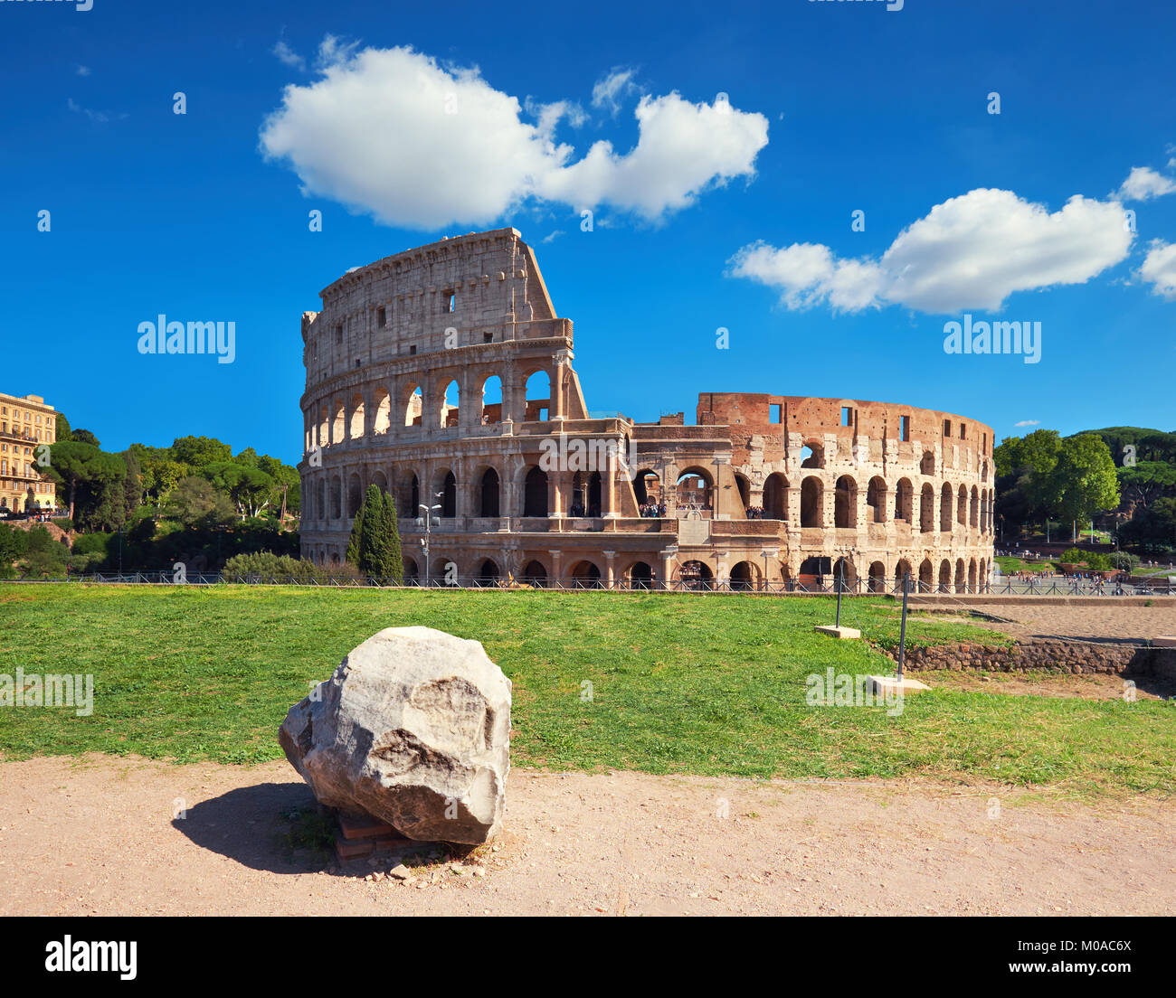 Rome, Italy. View of Colosseum from the Palatine Hill on a sunny day with blue sky and clouds. Stock Photo