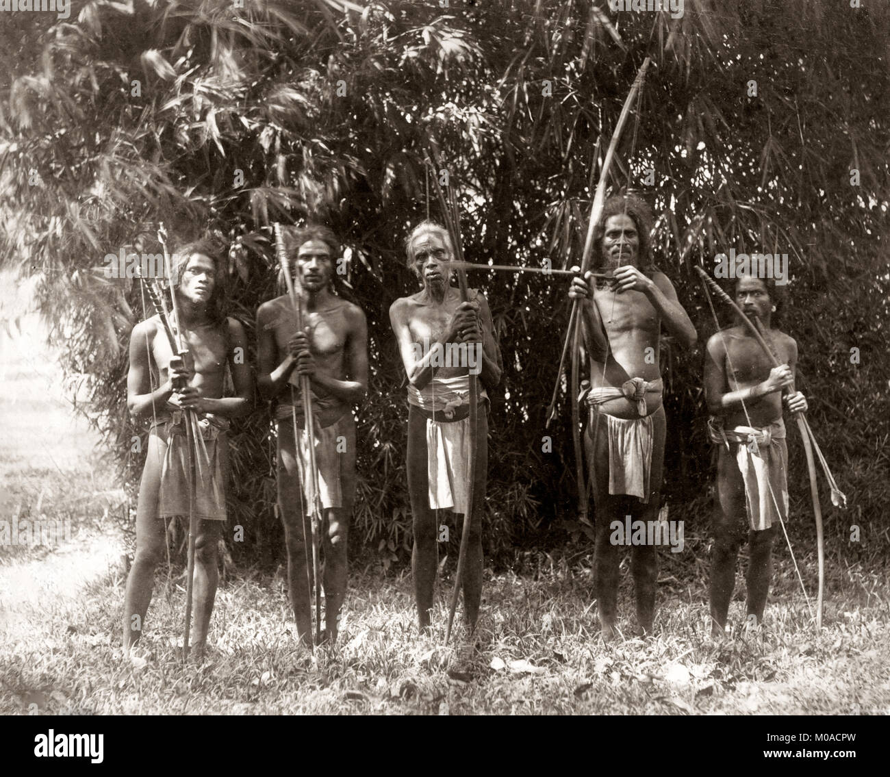Men from the Veddah tribe, bows and arrows, Ceylon, Sri Lanka, c.1880s Stock Photo