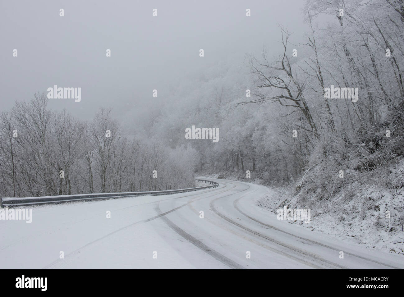 Snow covered roads in the mountains Stock Photo