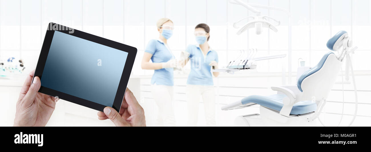 Dentist Hand Touch Digital Tablet Screen On Dental Clinic With