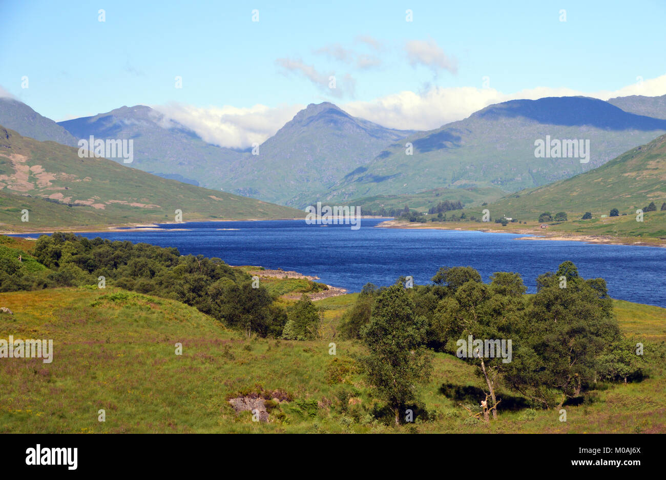 The Scottish Mountain Munros, Beinn Ime and Ben Vane from Loch Arklet in the Scottish Highlands, UK. Stock Photo