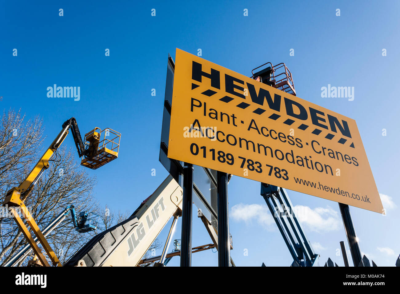 Hewden Plant and Machinery Hire Depot. Commonly known as cherry pickers, high access platforms at a site for rental of industrial plant machinery. Stock Photo