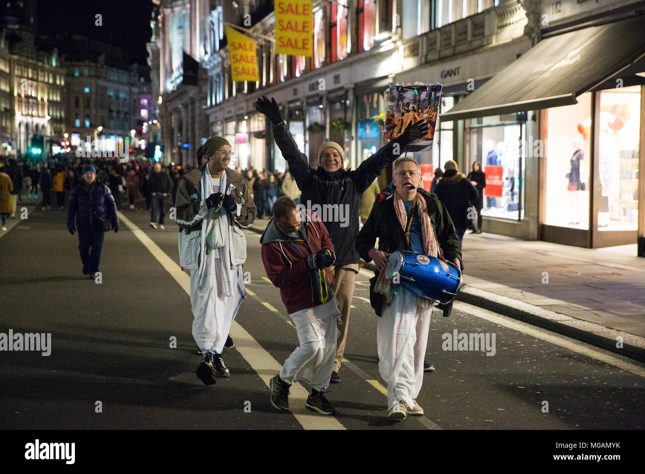 London, UK. 18th January, 2018. Devotees of Hare Krishna from the Radha-Krishna Temple chant in Regent Street. Stock Photo