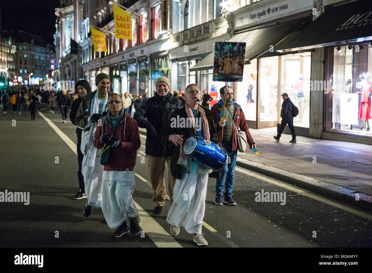 London, UK. 18th January, 2018. Devotees of Hare Krishna from the Radha-Krishna Temple chant in Regent Street. Stock Photo