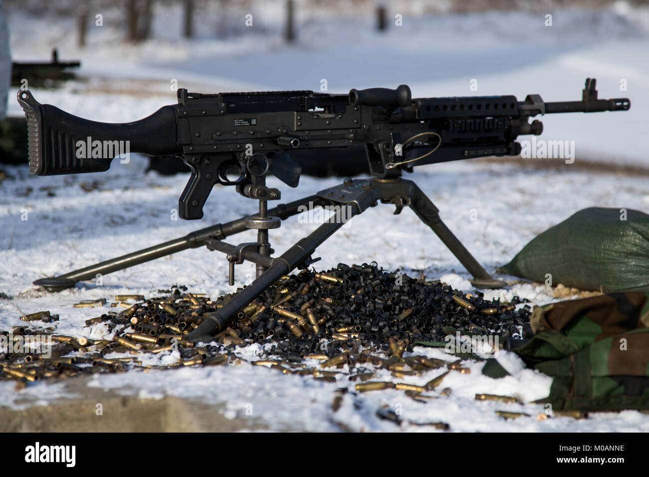 An M240B Machine Gun assigned Marine Air Control Group 28 after being fired on a range during Ullr Shield on Fort McCoy, Wis., Jan. 16, 2018. Stock Photo