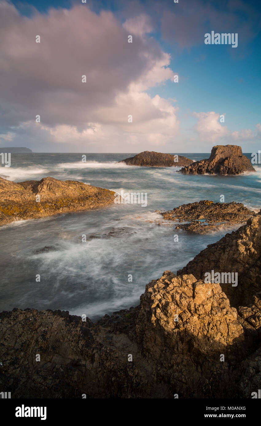 View of the scenic Causeway Coast at Ballintoy Harbour in County Antrim, Northern Ireland Stock Photo