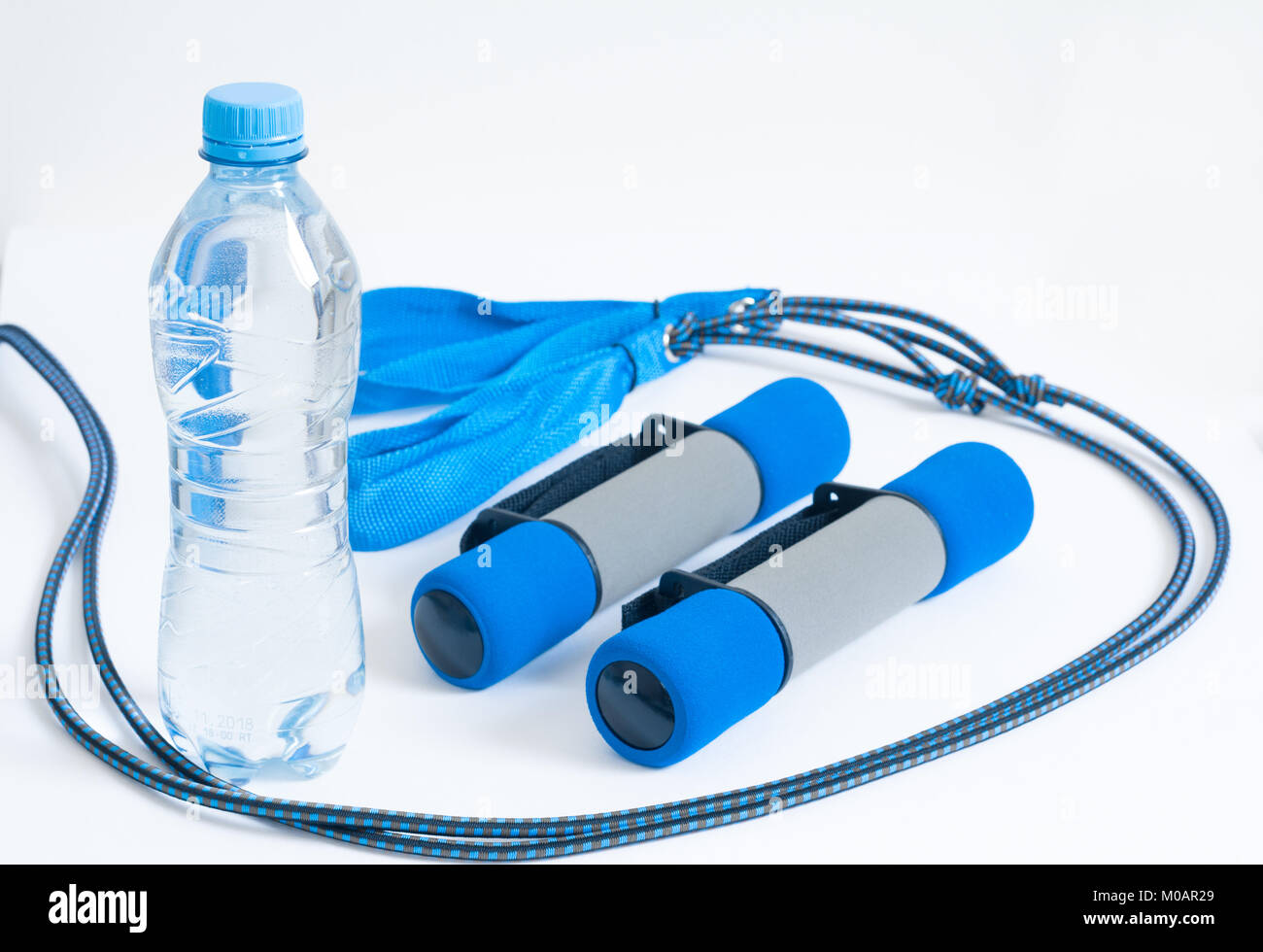 Water Container Exercise water bottle and exercise equipment isolated on white background Stock ...
