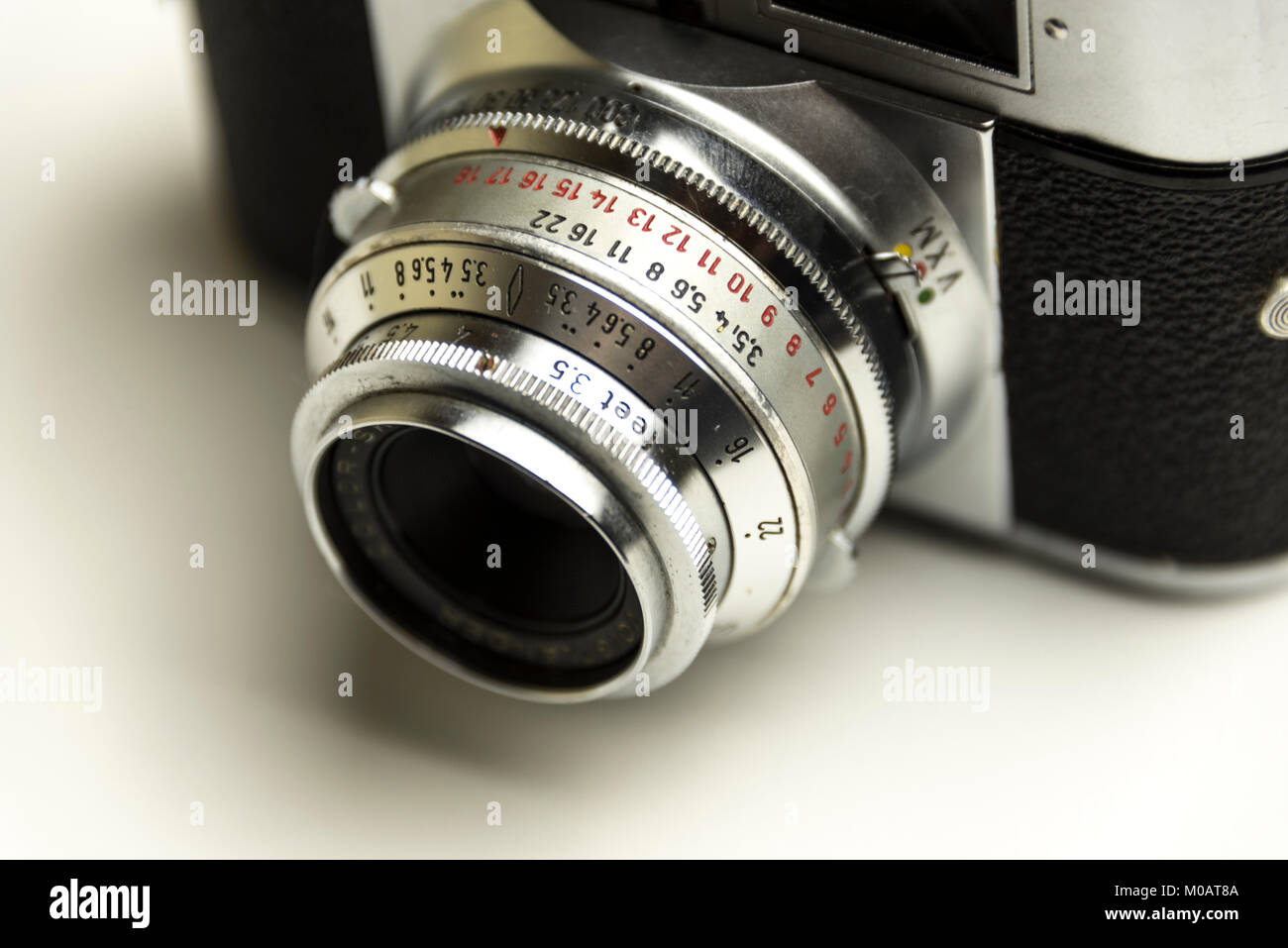 Vintage photo camera isolated on white background Stock Photo - Alamy