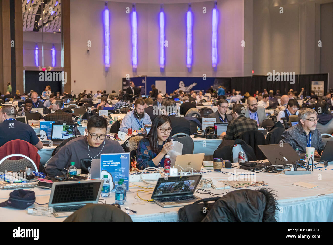 Detroit, Michigan - Journalists at work in the Michelin Media Center during the 2018 North American International Auto Show. About 5,000 journalists f Stock Photo