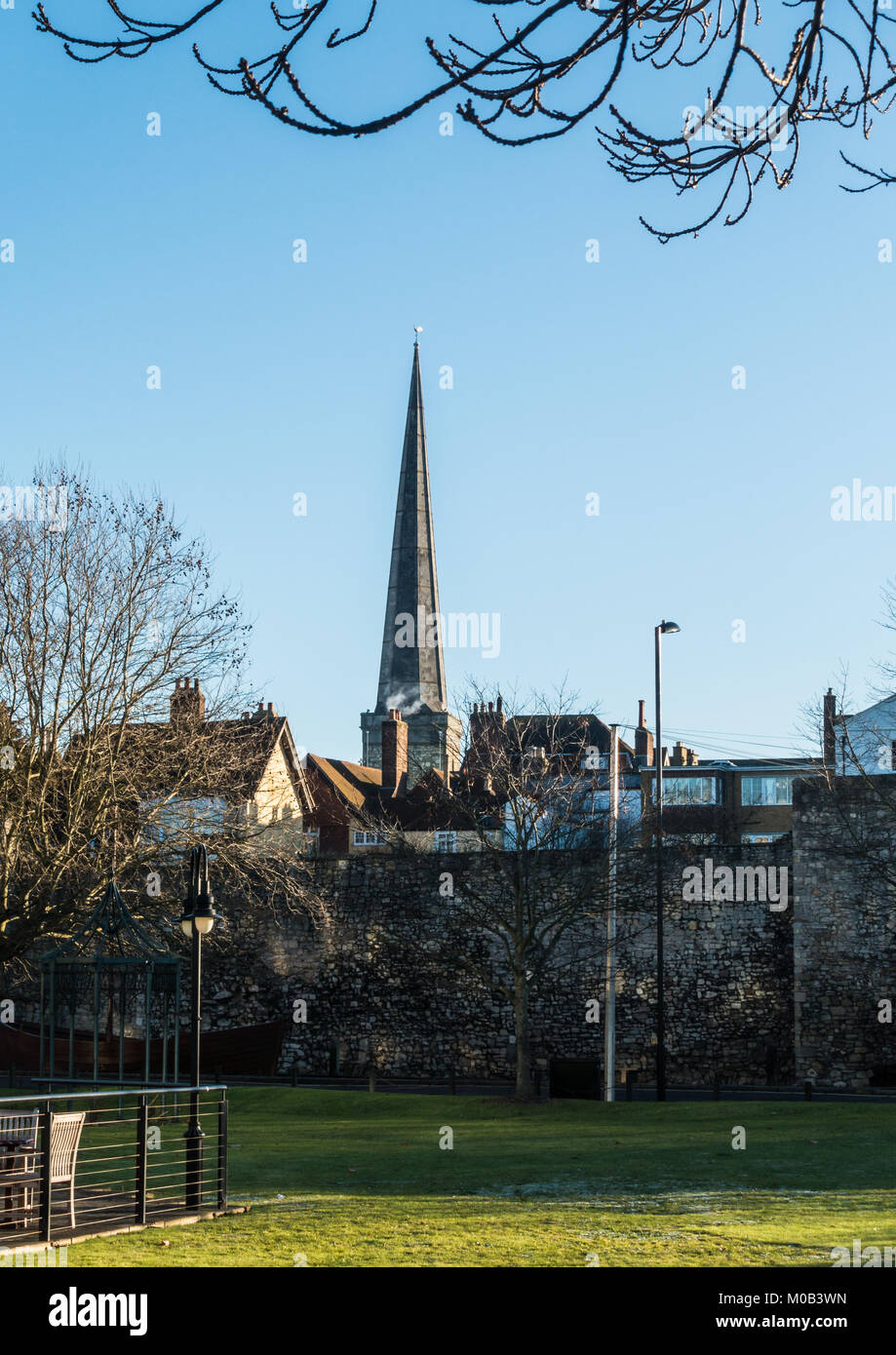 A shot of the spire of St Michaels Church in the distance, in Southampton, UK. Stock Photo