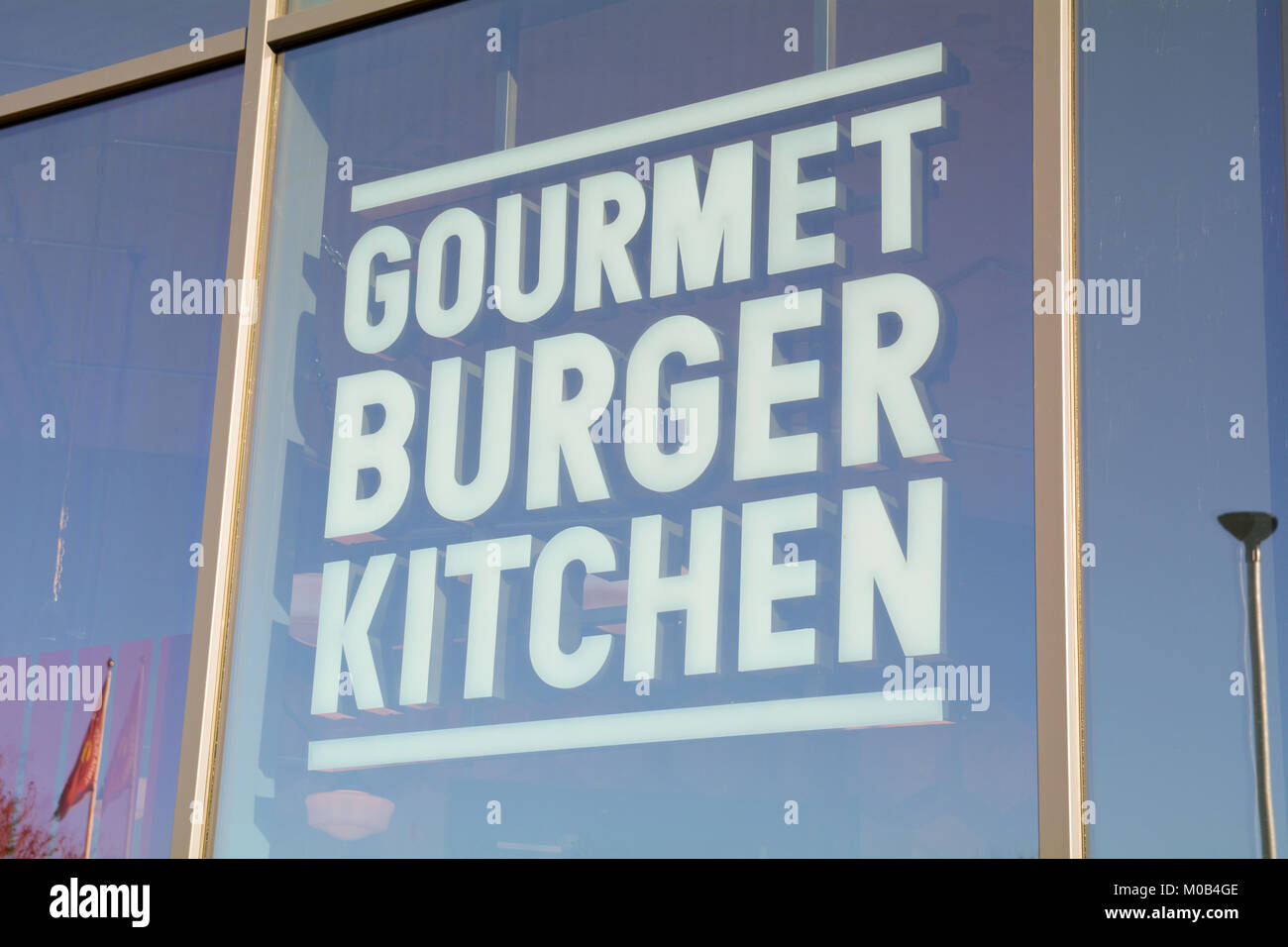 Gourmet Burger King sign in window of restaurant - they serve interesting but expensive burgers Stock Photo